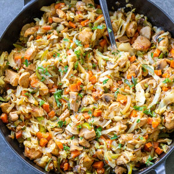 Braised cabbage with chicken in a pan