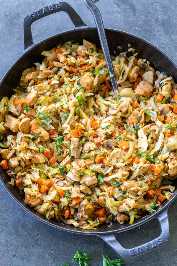 Braised cabbage with chicken in a pan 