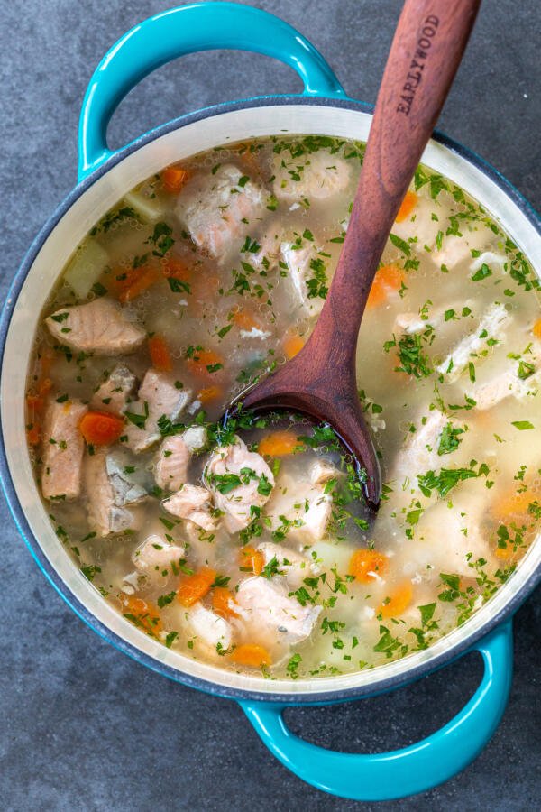 Ukha soup in a pot with a spoon