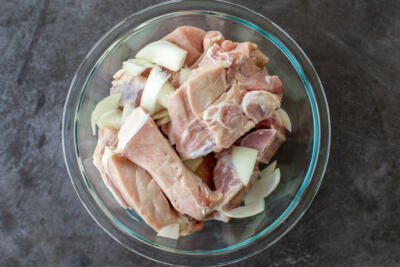 pork with onions in a bowl