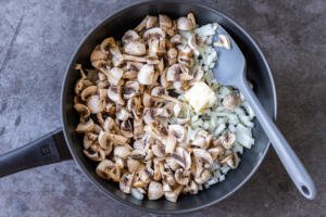 Butter with mushroom in a pan