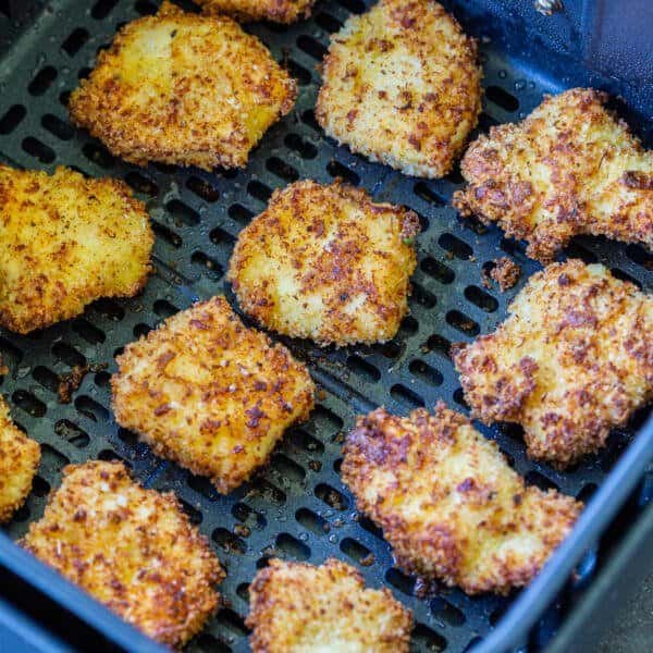 Cooked chicken nuggets in an air fryer