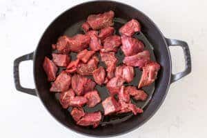 Beef cooking on a pan