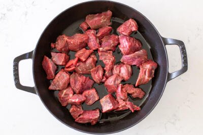 Beef cooking on a pan