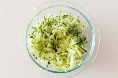 shredded zucchini in a bowl