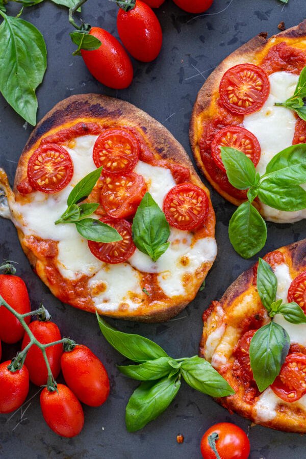 Baked Margherita Flatbread Pizza on a serving tray