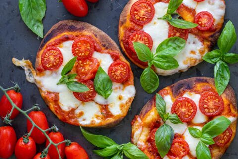 Baked Margherita Flatbread Pizza on a serving tray