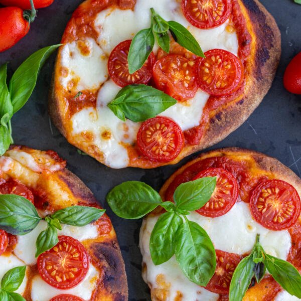 Baked Margherita Flatbread Pizza on a serving tray