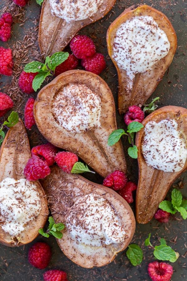 Pears with toppings on a serving tray