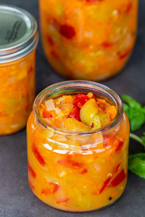 Canned green tomatoes in a jar