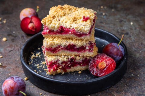 slices on a plate of plum crumble