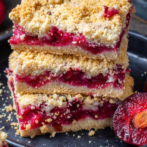 slices on a plate of plum crumble