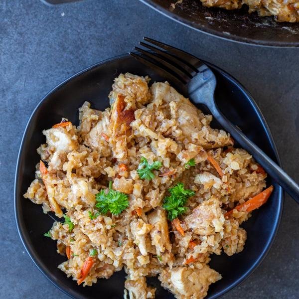 Creamy Cauliflower Rice with Chicken in a bowl