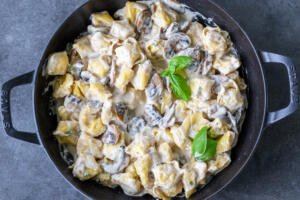 Mushroom cream tortellini in a pan