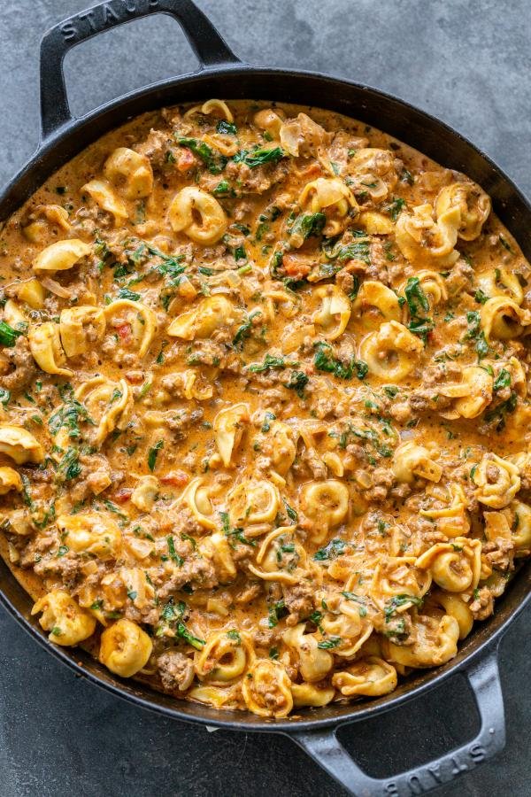 Creamy Spinach Tomato Tortellini in a pan