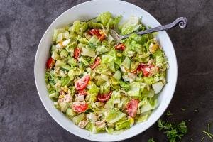 Cobb Salad with Tuna with dressing tossed in the salad