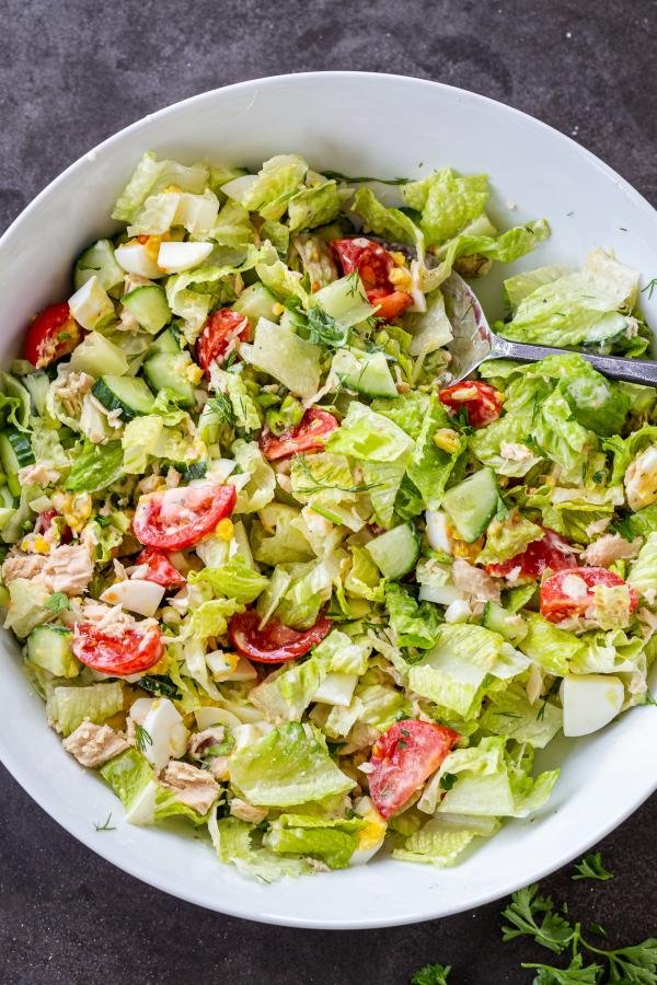 Cobb Salad with Tuna with dressing tossed in the salad