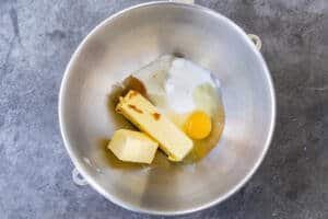 butter with eggs and sugar in a mixing bowl
