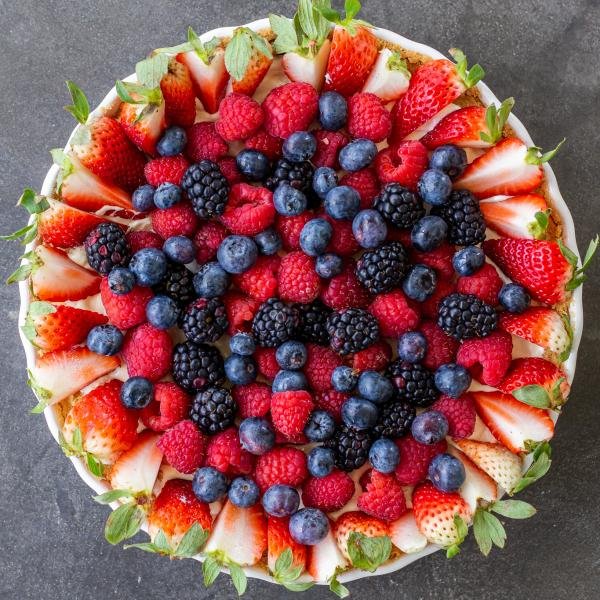 berries on top of a tart