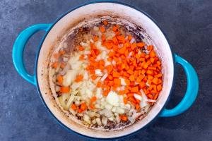Carrots and onion in a pot