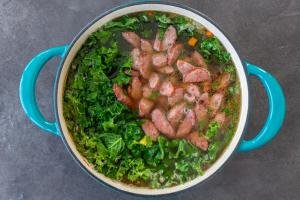 Sausage anf kale in a pot