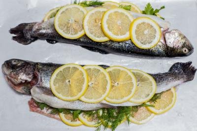 Seasoned trout with lemon and herbs.