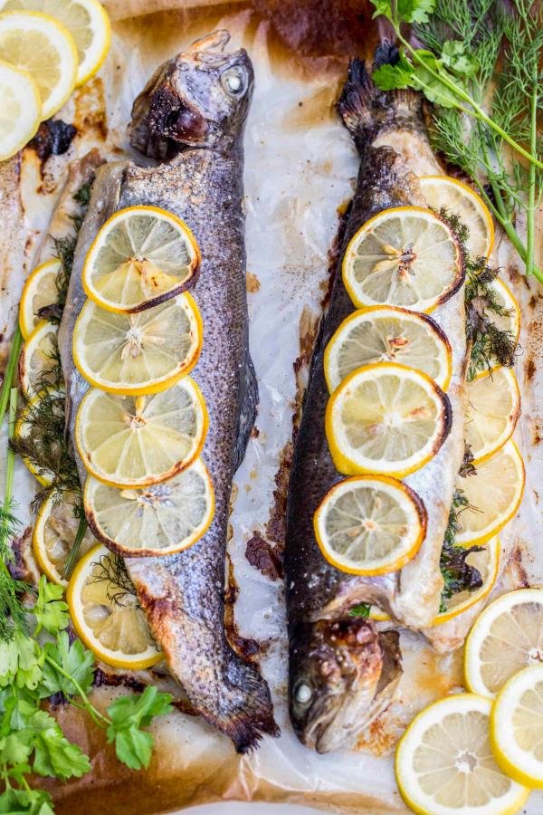 Baked herb lemon trout on a tray. 