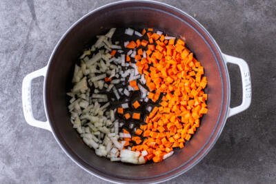 Carrots and onions in a pot