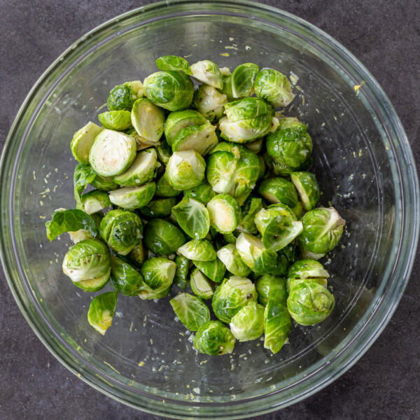 Brussels Sprouts seasoned in a bowl