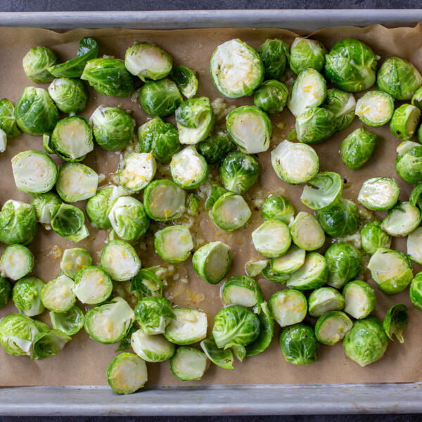 Seasoned Brussels Sprouts on a baking sheet