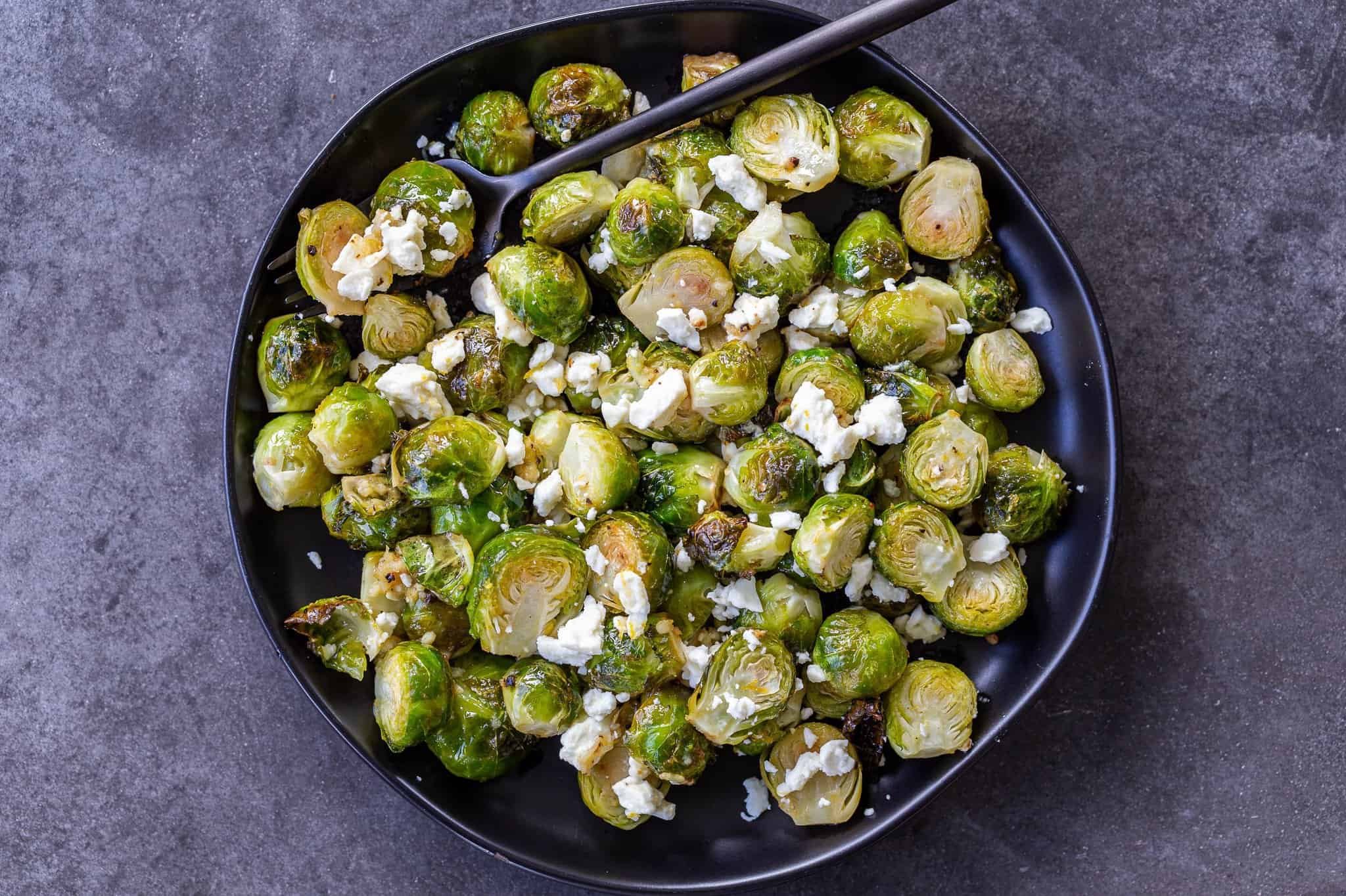 Cheese Ravioli with Sautéed Brussels Sprouts - Serving Dumplings