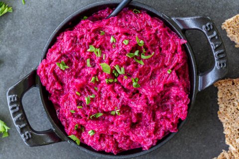 Russian beet salad with garlic in a bowl