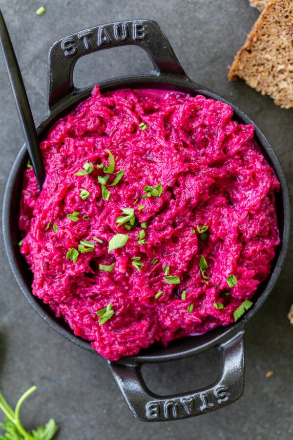 Russian beet salad with garlic in a bowl 