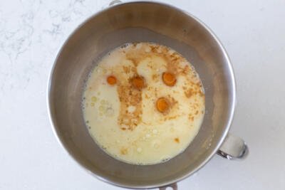liquids and eggs in a mixing bowl