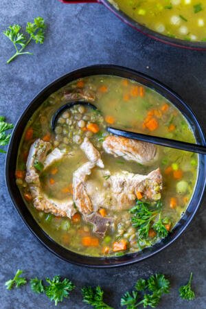 Split Pea and Lentil Soup with Pork Chops in a bowl