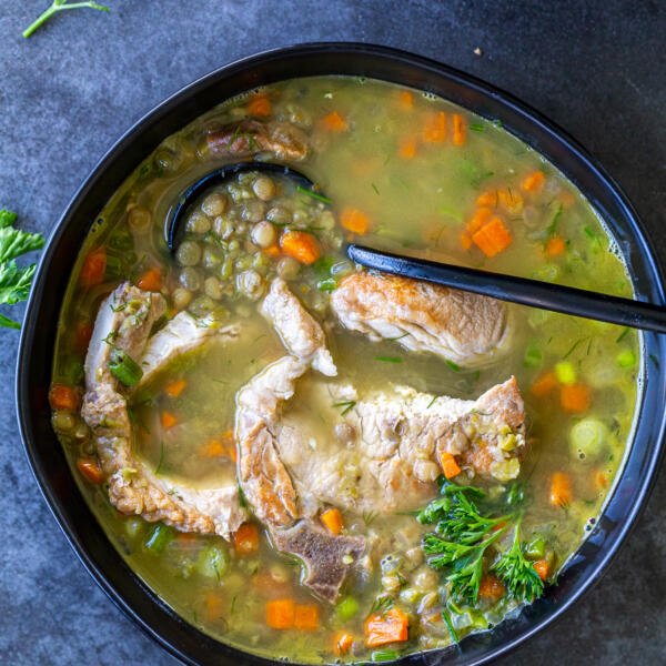 Split Pea and Lentil Soup with Pork Chops in a bowl