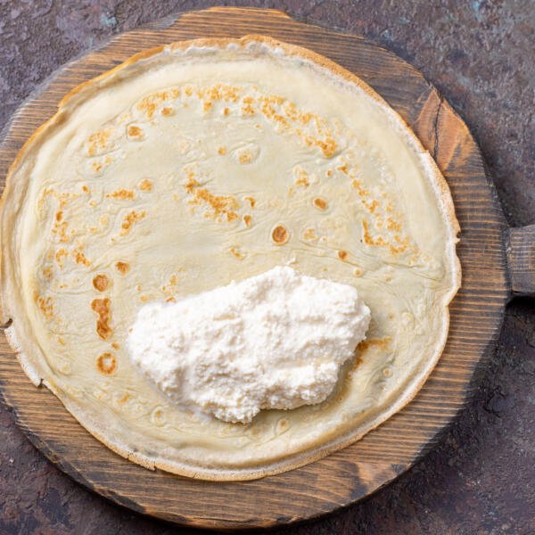 Blintzes with filling on it