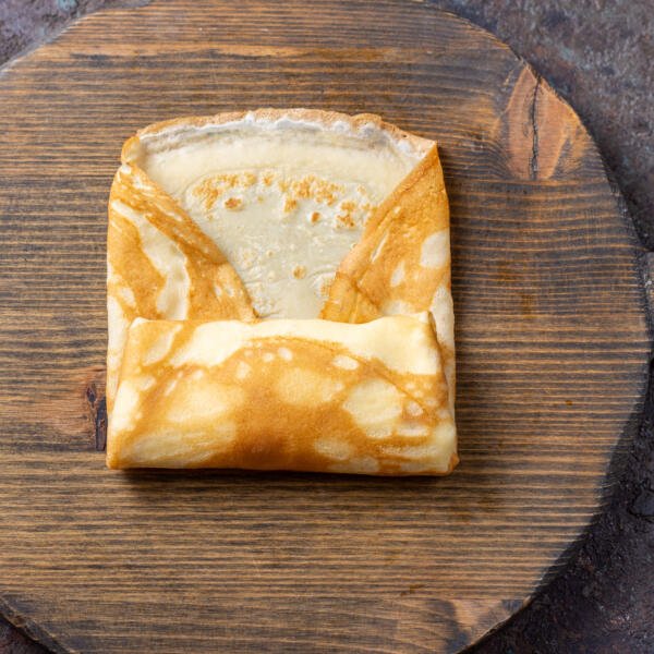 Blintzes filled on a surface