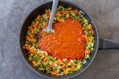 veggies with sauce in a pan