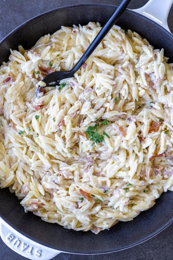 Creamy Orzo Bacon Pasta in a serving tray. 