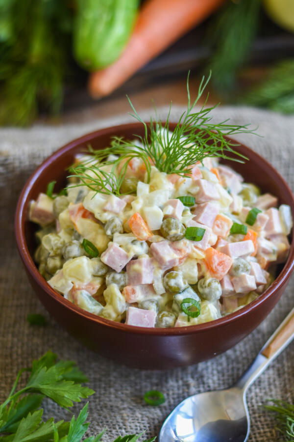 A bowl of Olivier Potato Salad. 