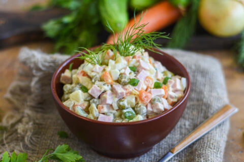 A bowl of Olivier Potato Salad.