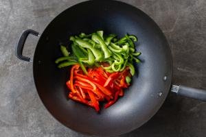 Pepper sliced in a wok