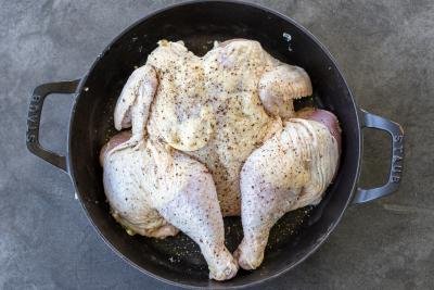 seasoned chicken on a baking pan