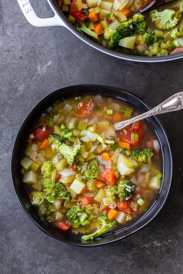 Vegetable Soup in a bowl with a spoon