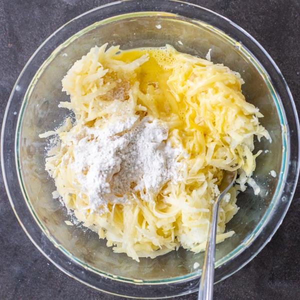 All the latkes ingredients in a bowl
