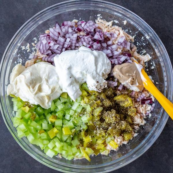 tuna salad ion a serving bowl with dressing