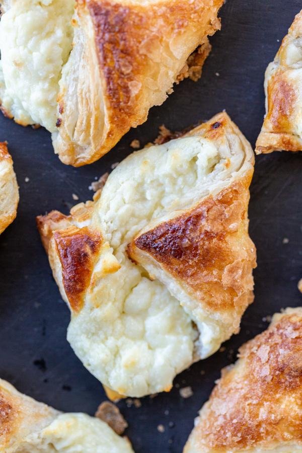 Puff Pastry Cheese Turnovers on a serving tray