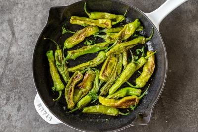 Sautéed Shishito Peppers in a pan