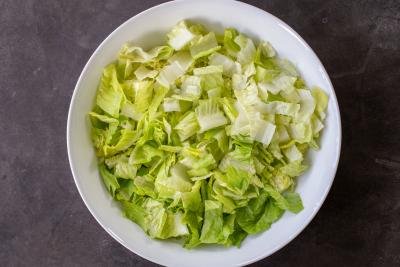 Chopped lettuce in a bowl.